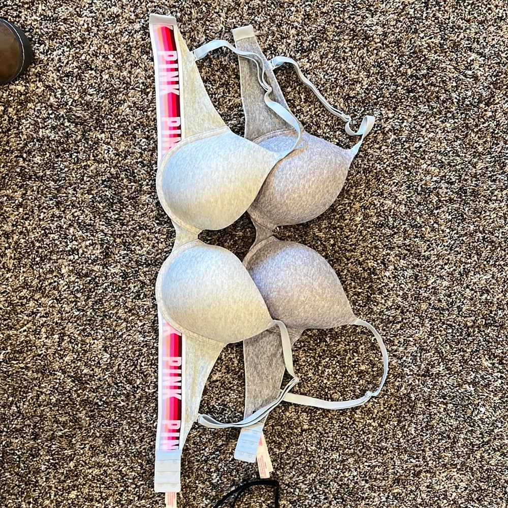 Two like new Victorias Secret Pink bras. 32DD